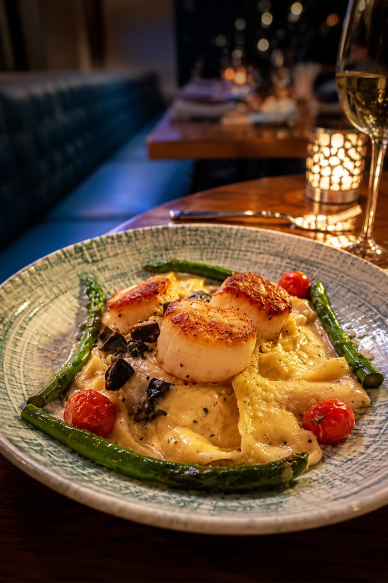 Seared scallops at Bosforo Seafood & Steaks in Miramar Beach