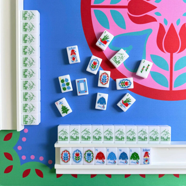 Merry Mahjong Co. Scandinavian Christmas mahjong tiles in red and green