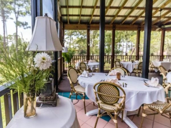 Covered patio dining at Basmati’s Asian Cuisine in Blue Mountain Beach, Florida