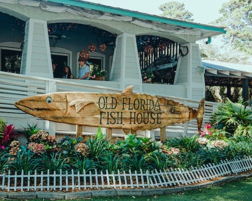 Old Florida Fish House wooden fish-shaped sign in Santa Rosa Beach, Florida